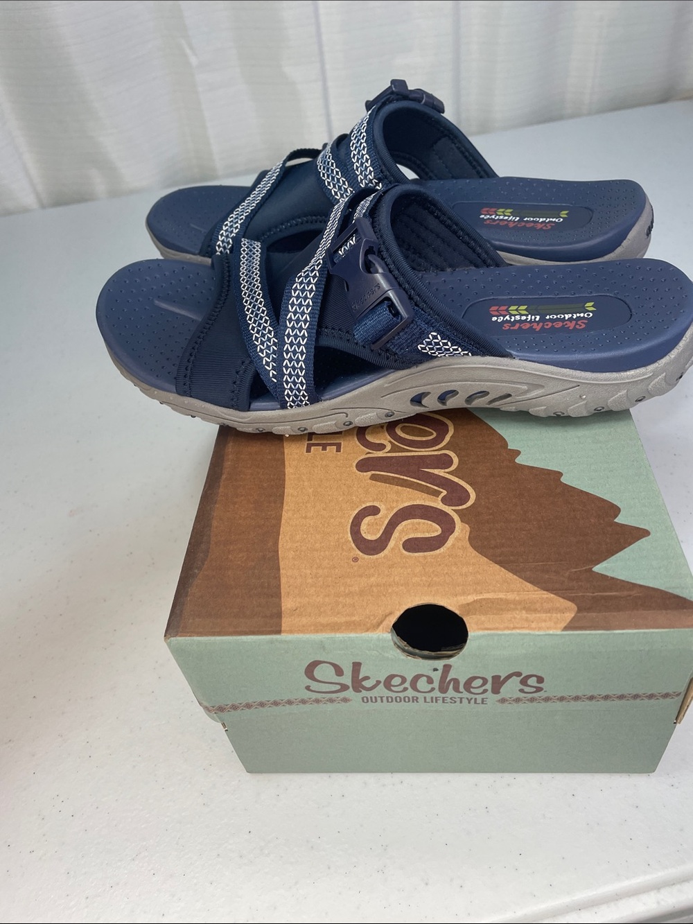 Skechers women’s Navy and White Slip-On Sport Sandals - Picture 6 of 9